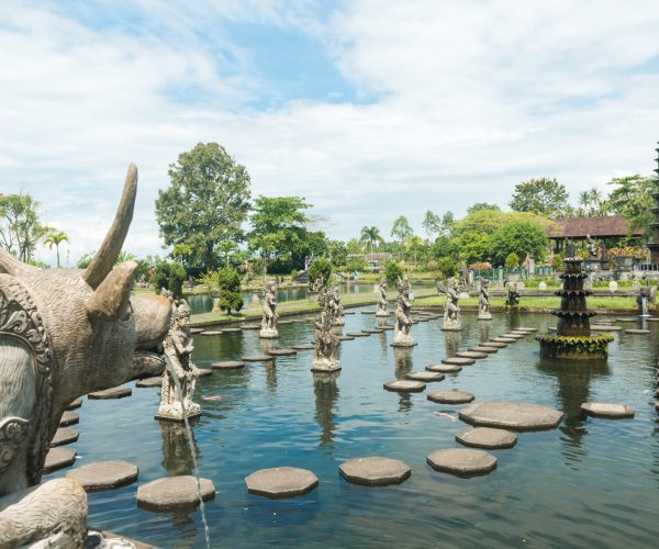 Tirtagangga water palace with fountains and ponds on Bali, Indonesia